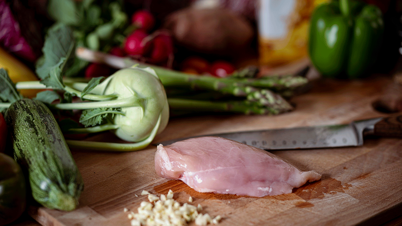Raw chicken on a cutting board