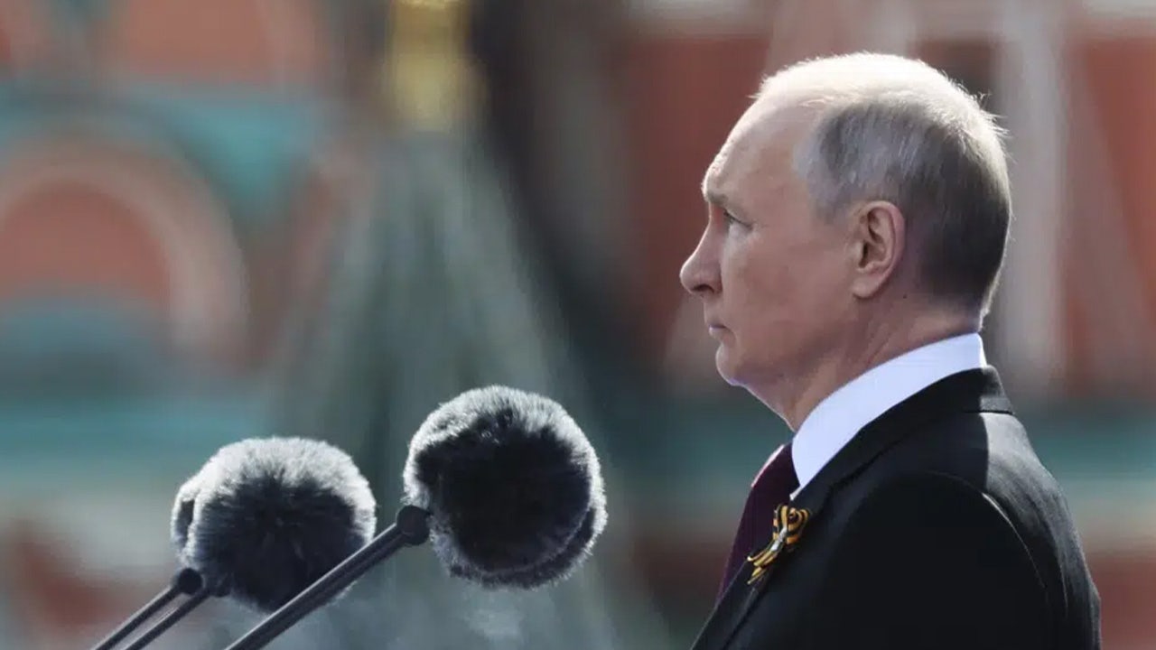 Putin claims West is waging 'real war' on Russia during scaled-down Victory Day celebration