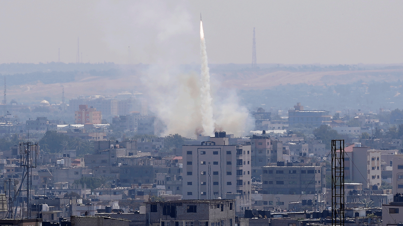 Rockets launched during the day in a city