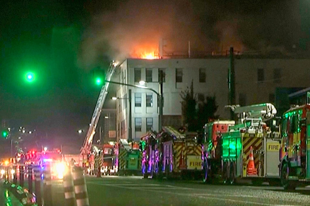 Hostel fire kills at least 6 in waterfront city as cops investigate possible arson