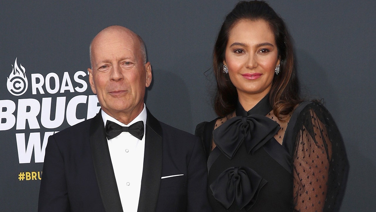 Bruce Willis and his wife Emma Hemingway at a roast of Bruce Willis