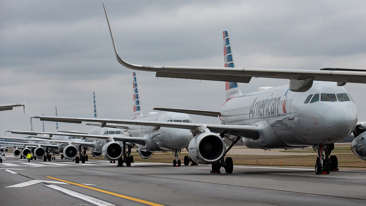 Massachusetts troopers and FBI agents respond to American Airlines flight in Boston for reported criminal act