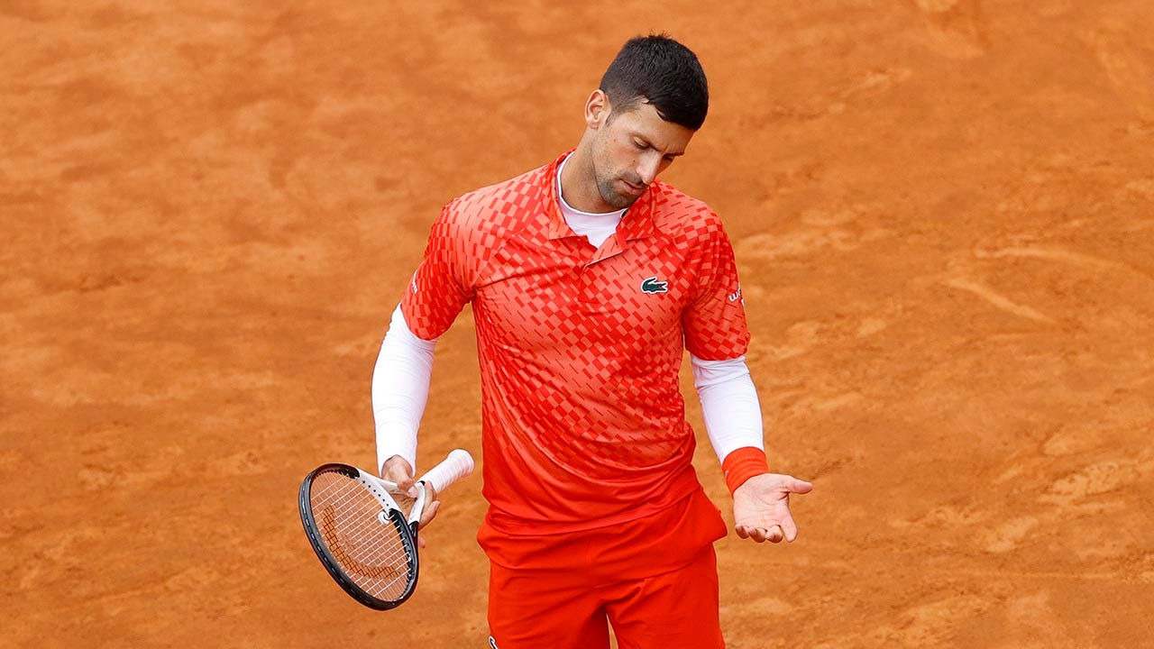 Serbia's Novak Djokovic shouts during the quarter final match against  Denmark's Holger Rune at the Italian Open tennis tournament, in Rome,  Wednesday, May 17, 2023. (AP Photo/Gregorio Borgia Stock Photo - Alamy