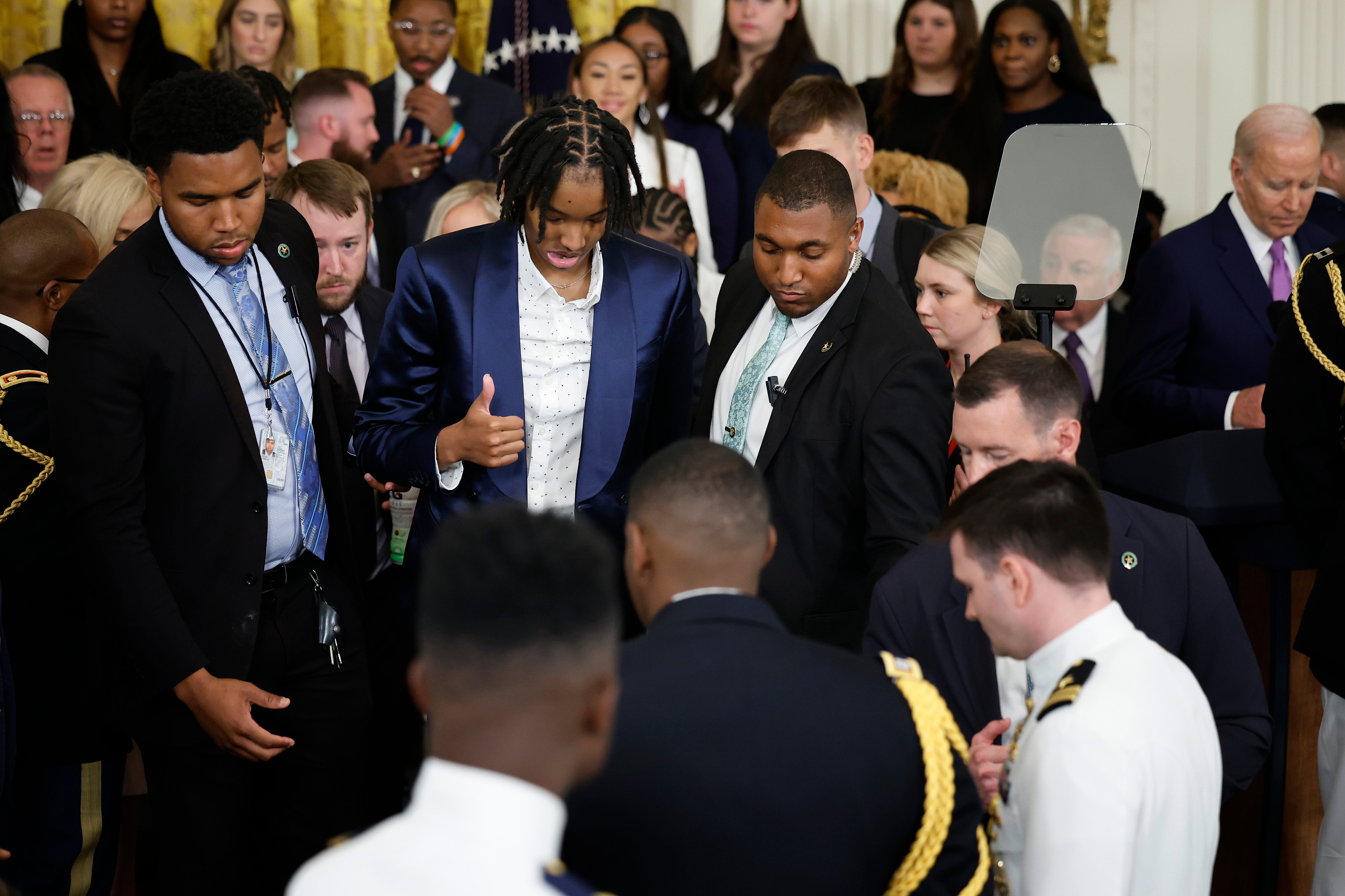 President Biden’s speech paused after the LSU women’s basketball star collapsed during a White House visit