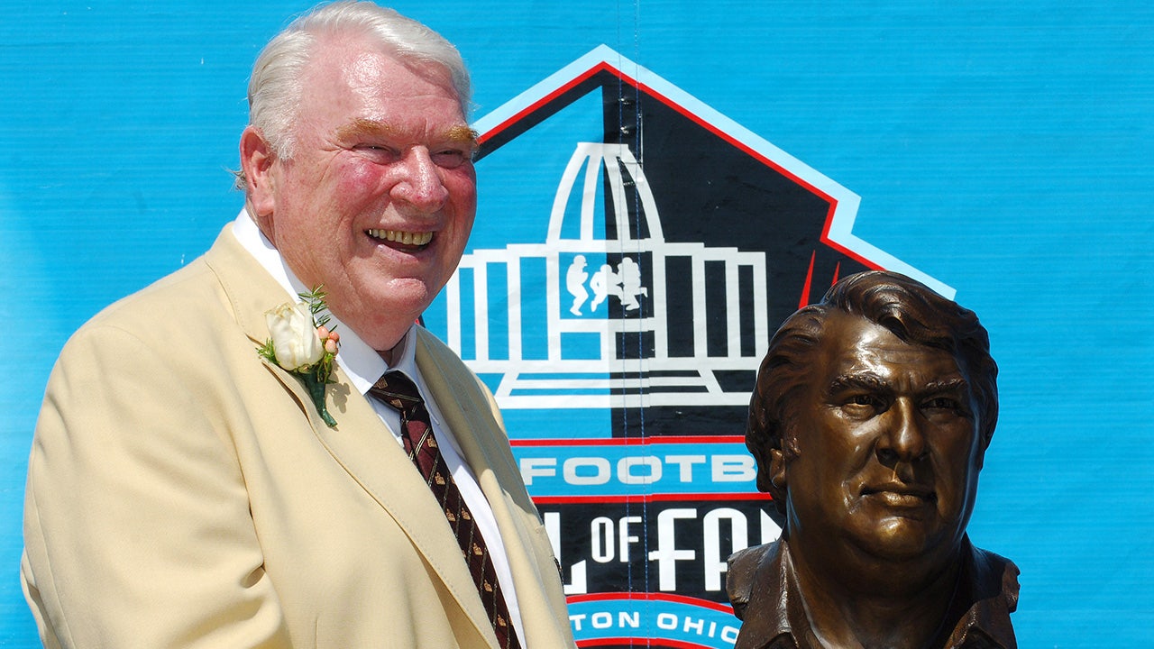 John Madden with a NFL Pro Football Hall of Fame
