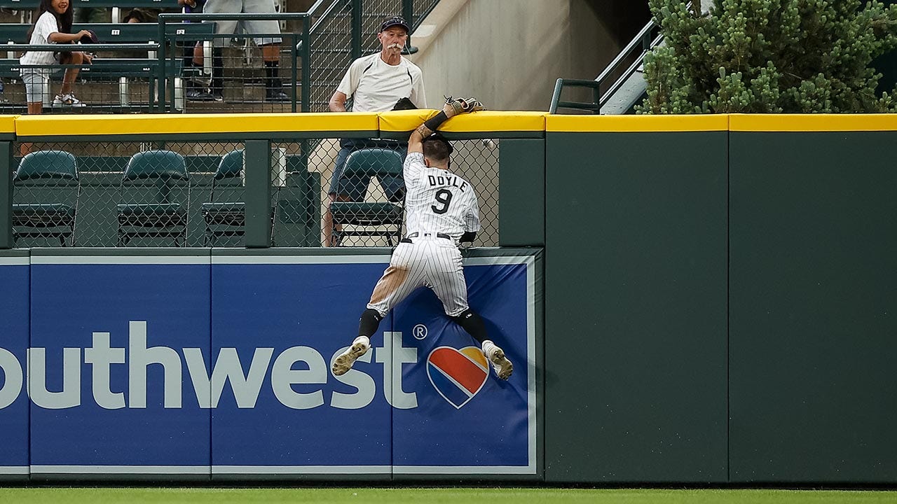 Doyle has first 2-HR game, Castro 2-run double lifts Rockies past Reds 9-8