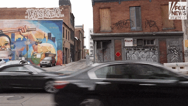 GIF shows vacant buildings and row homes across Baltimore