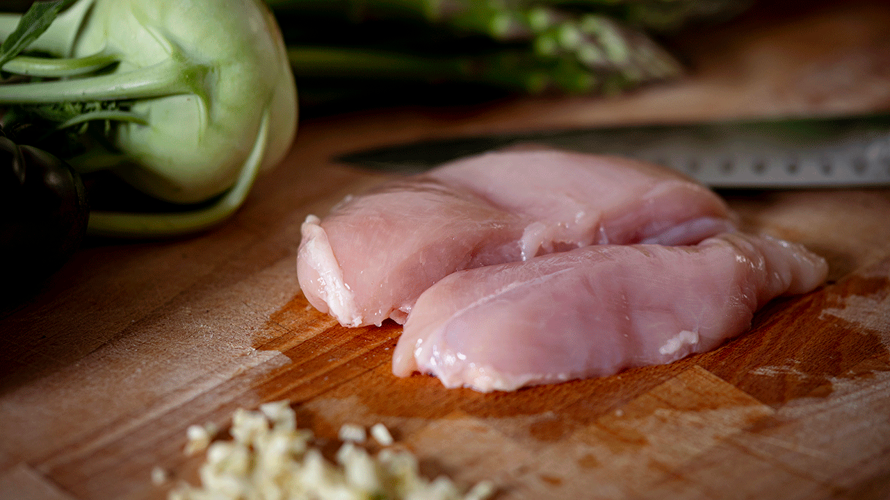 Chicken breast on a cutting board