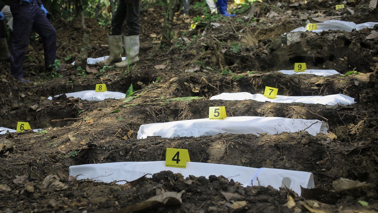 At least 20 bodies found in Congo mass grave, ISIS-linked rebels suspected
