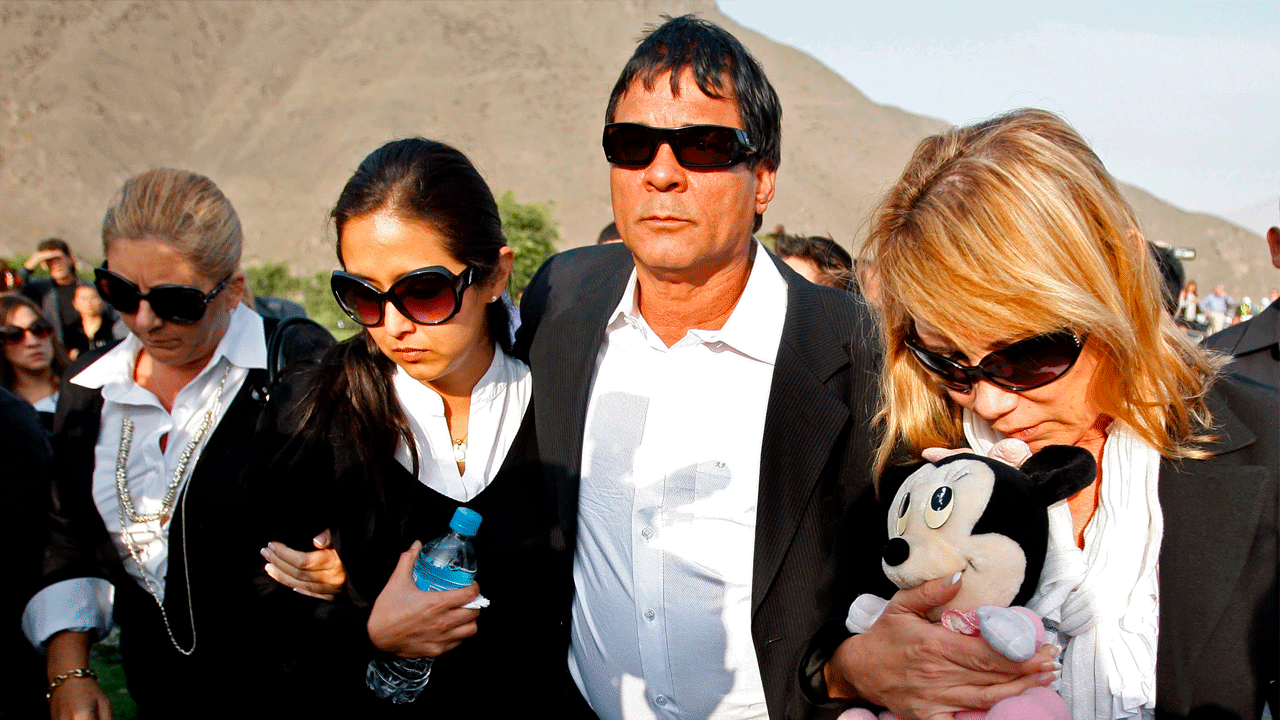 Family mourning at funeral