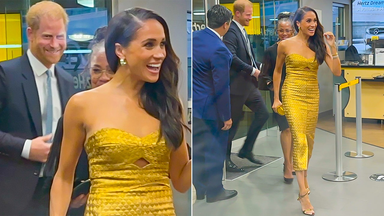 Meghan Markle all smiles in gold gown alongside Prince Harry for post-coronation award