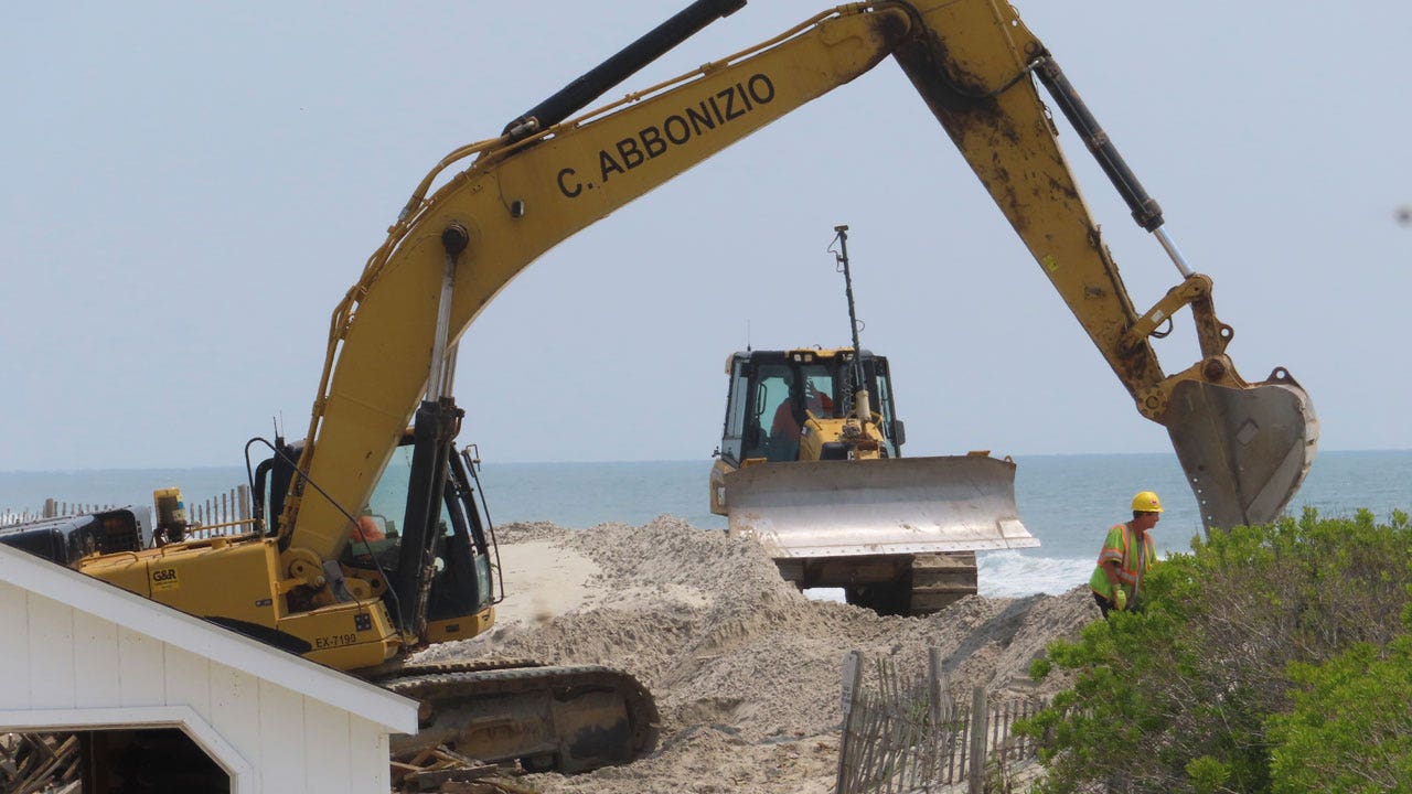 NJ shore town fined $12M for building own dunes begins emergency beachfront repairs