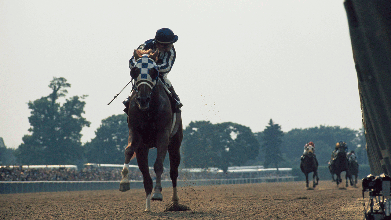 Secretaría y jockey Ron Turcotte compitiendo en Belmont Stakes