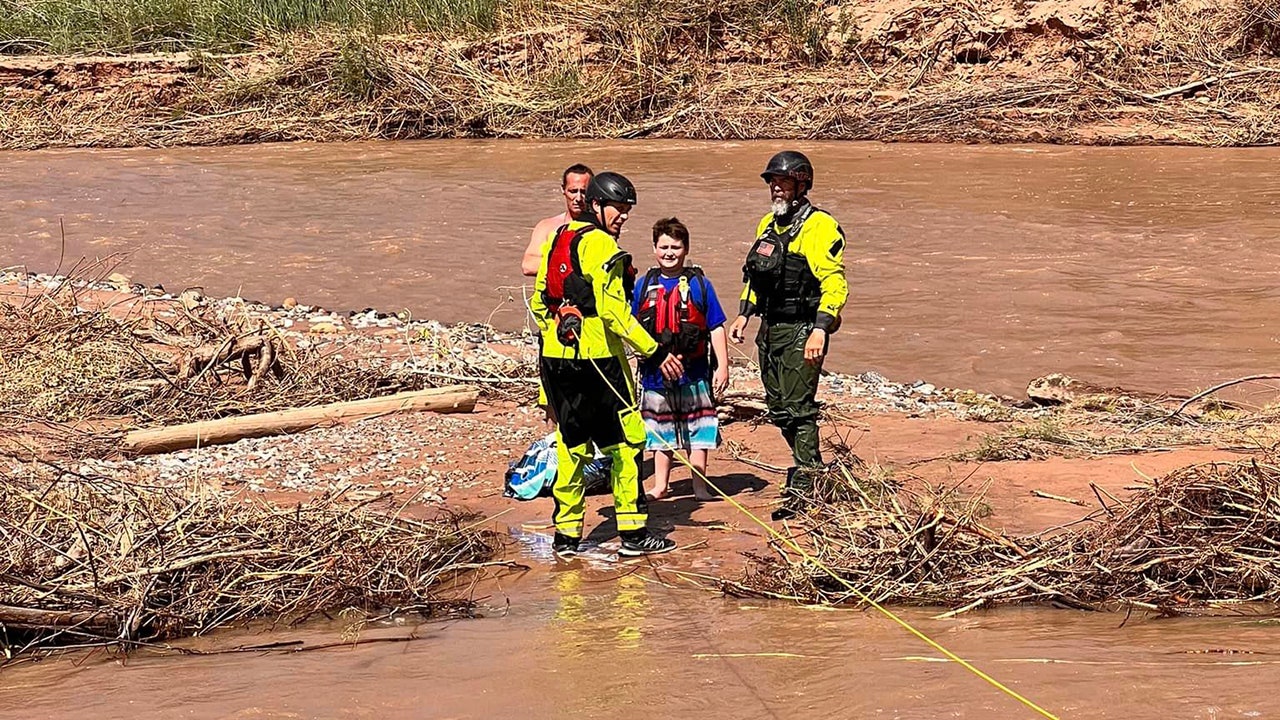 Utah dad and son rescued from sandbar after falling into swift-moving river, video shows