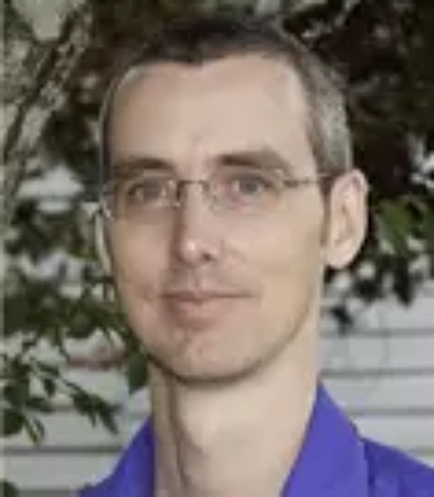 Slain Oregon doctor's ex-wife charged years after home-invasion murder