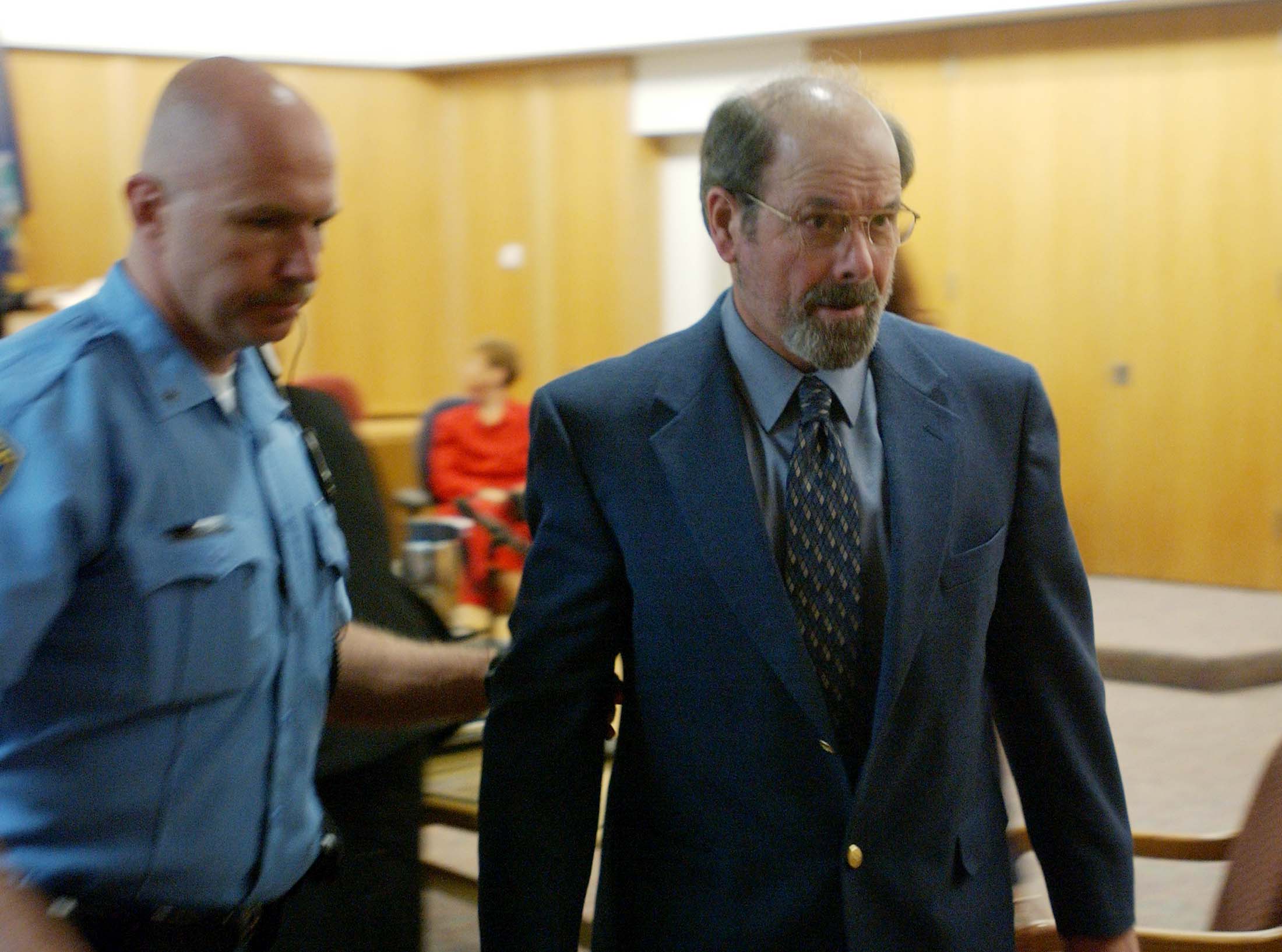 BTK murders suspect Dennis Rader is led out of his arraignment in Wichita Kansas.