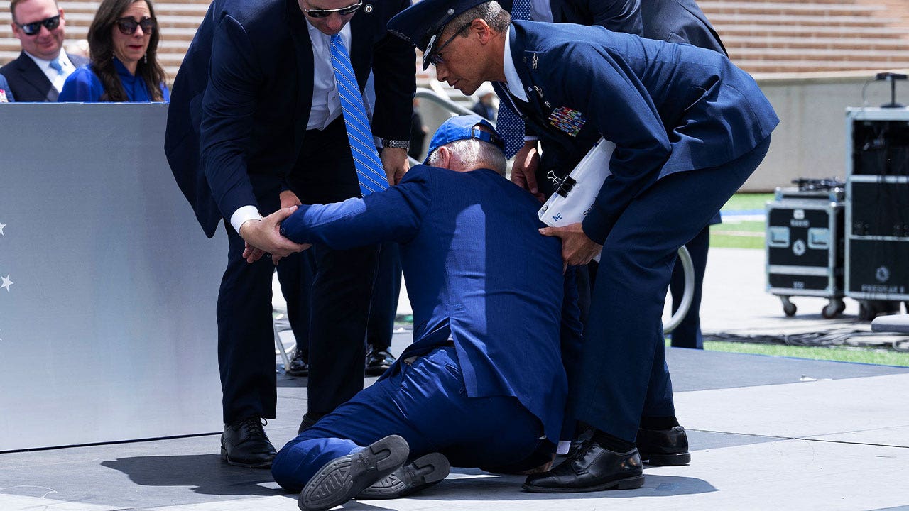 Watch Air Force cadets react after Biden fell right in front of them