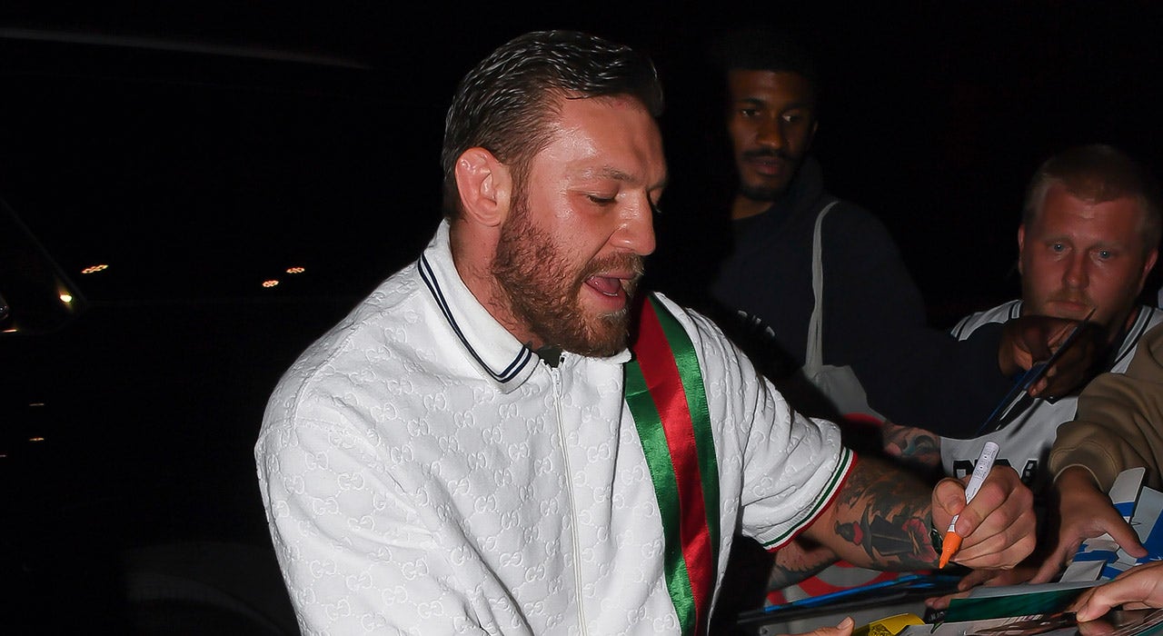 Conor McGregor signs autographs in New York days after rape allegations