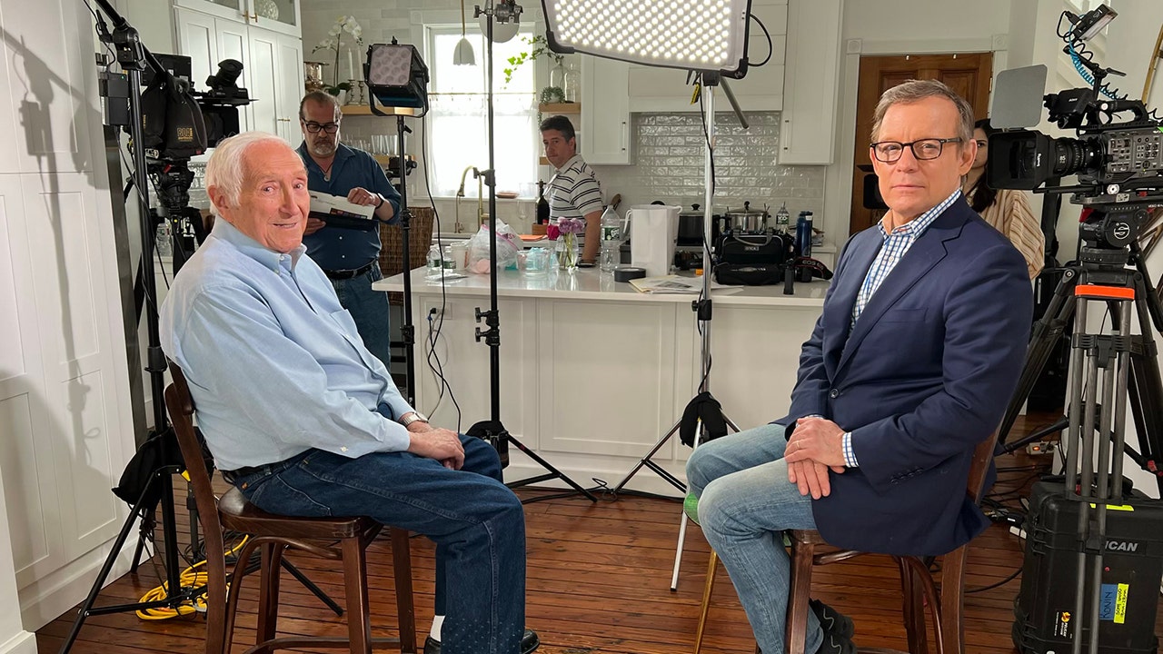 Fox News Eric Shawn and Gabe Briguglio sitting with camera setup