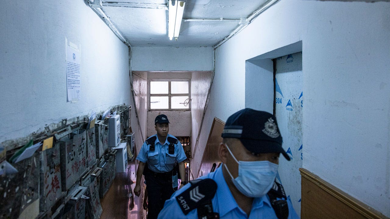 Hong Kong woman arrested for allegedly killing her 3 young daughters