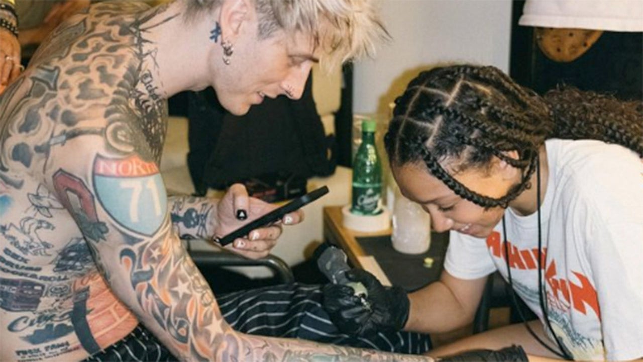 Machine Gun Kelly’s 13-year-old daughter inks tattoo on her father