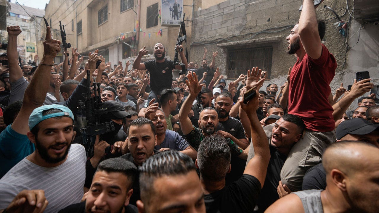 Palestinians celebrate as Israeli forces retreat from Balata refugee camp in northern West Bank