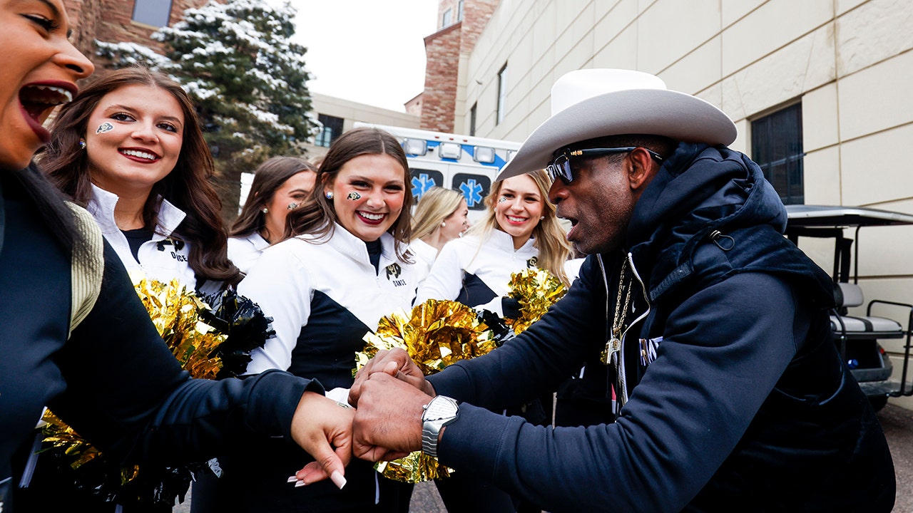 Deion Sanders meets with cheerleaders