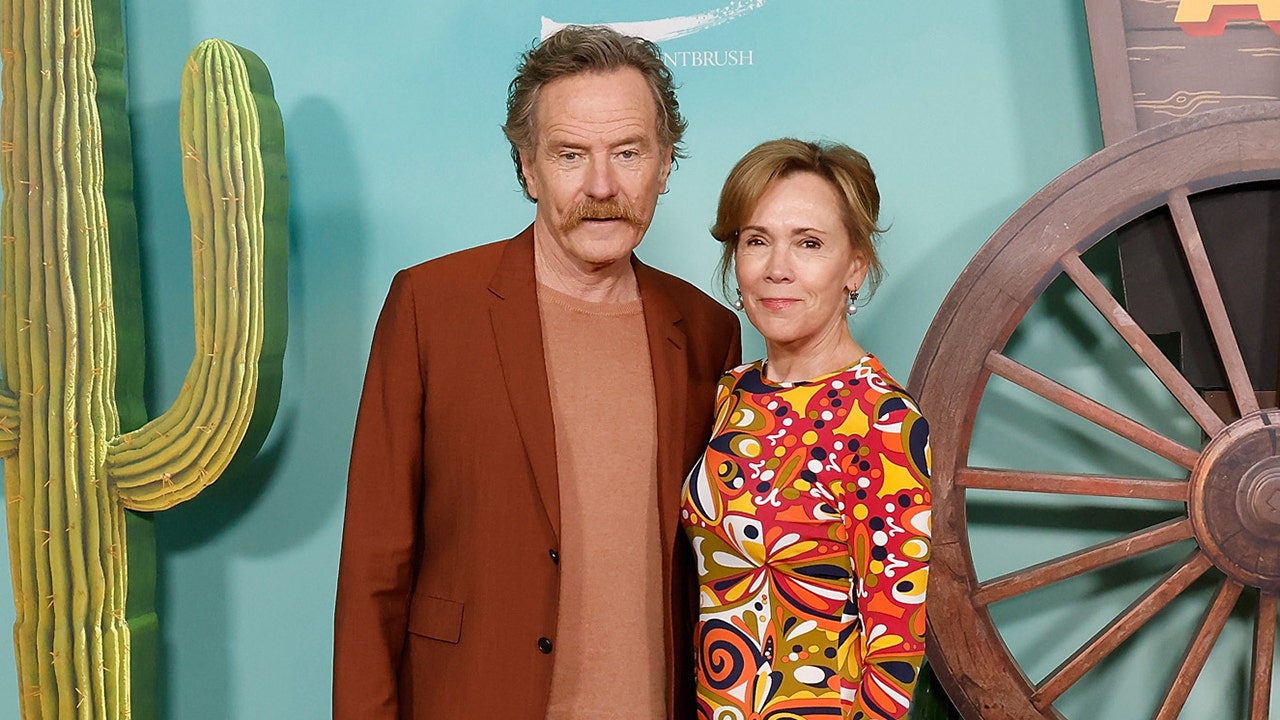 Bryan Cranston and wife Robin coordinate in groovy attire at Asteroid City premiere