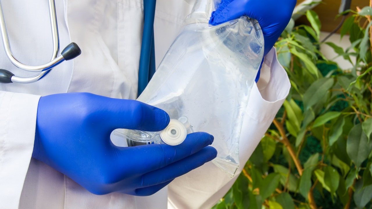 Doctor with IV bag