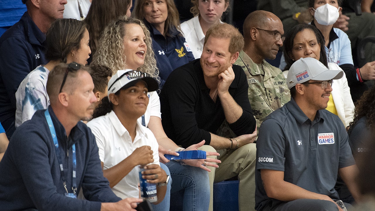 Prince Harry cheers on wounded vets at Warrior Games following UK court appearance
