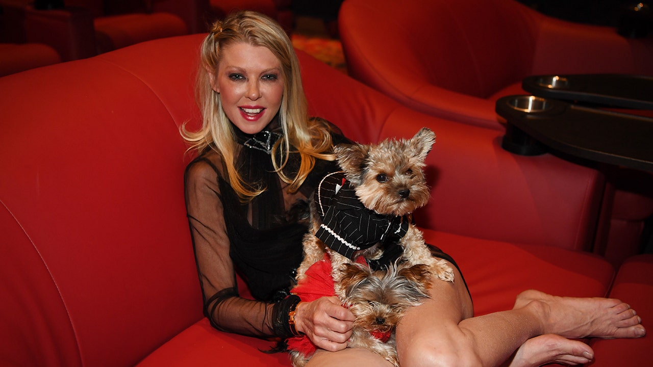 Tara Reid with her dogs