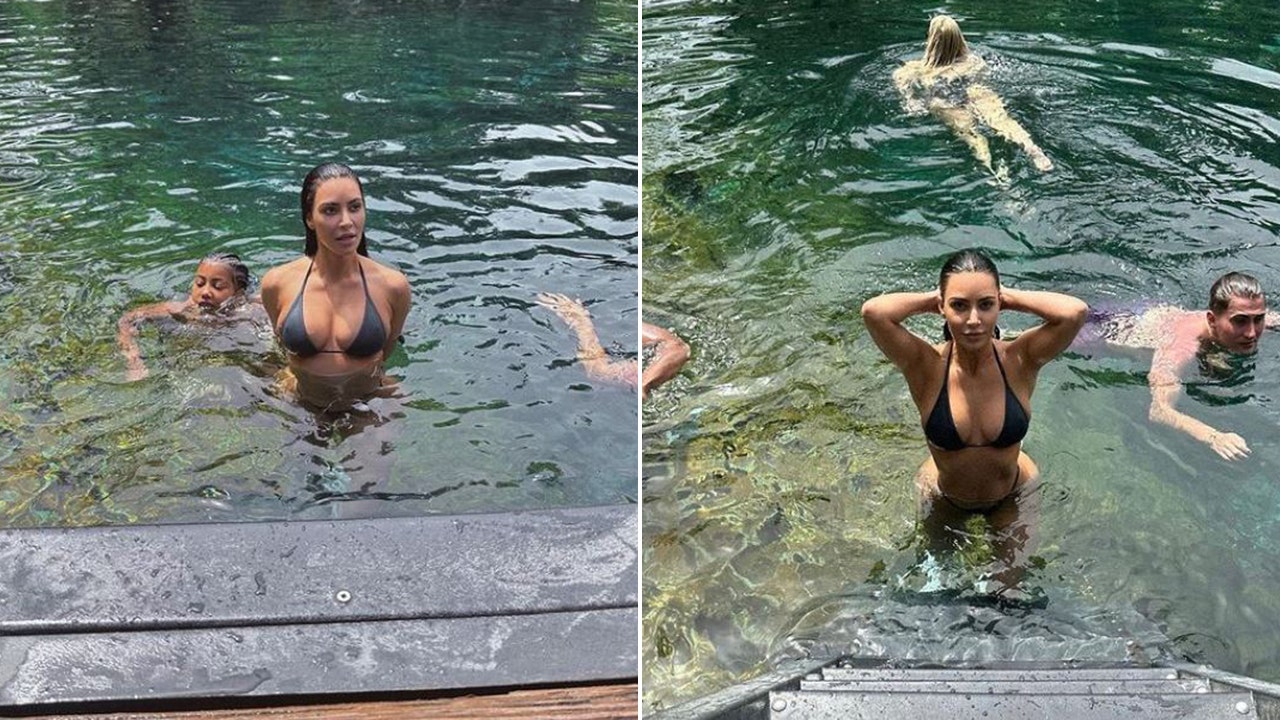 Kim Kardashian posing in the water