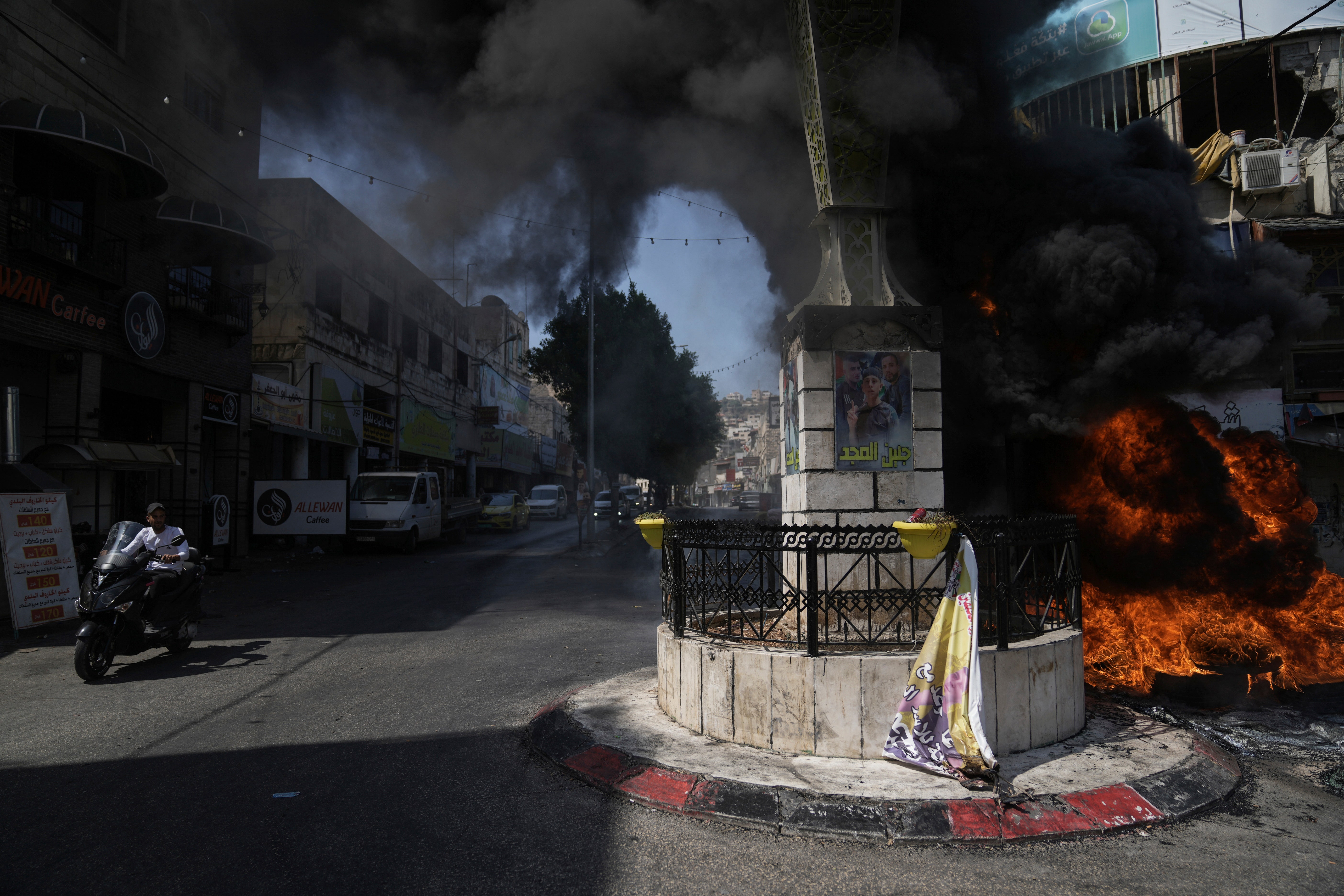 Israeli forces reveal weapons caches hidden under Palestinian mosque after raid