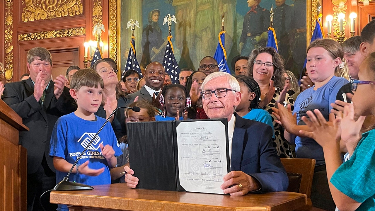 WI Gov. Tony Evers signs spending plan after gutting GOP tax cut, increasing school funding for over 400 years