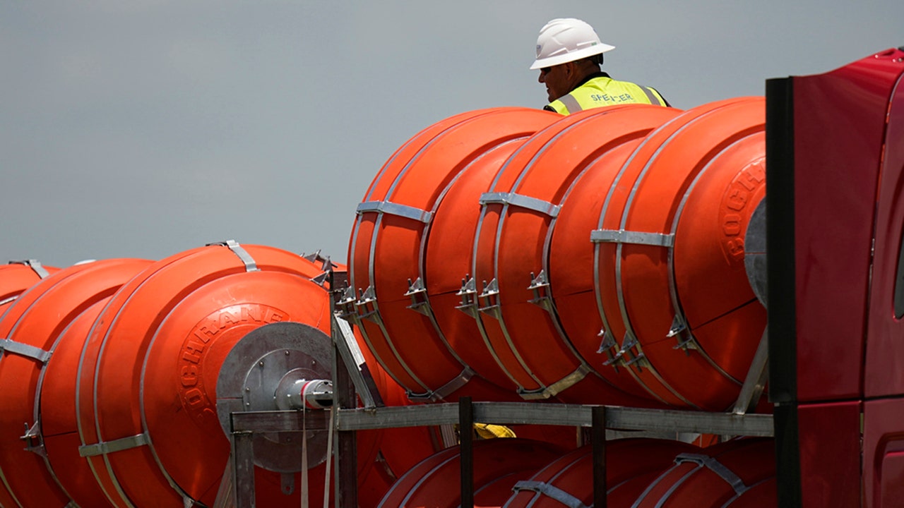 Abbott moves ahead with floating border barriers on Rio Grande despite liberal outrage