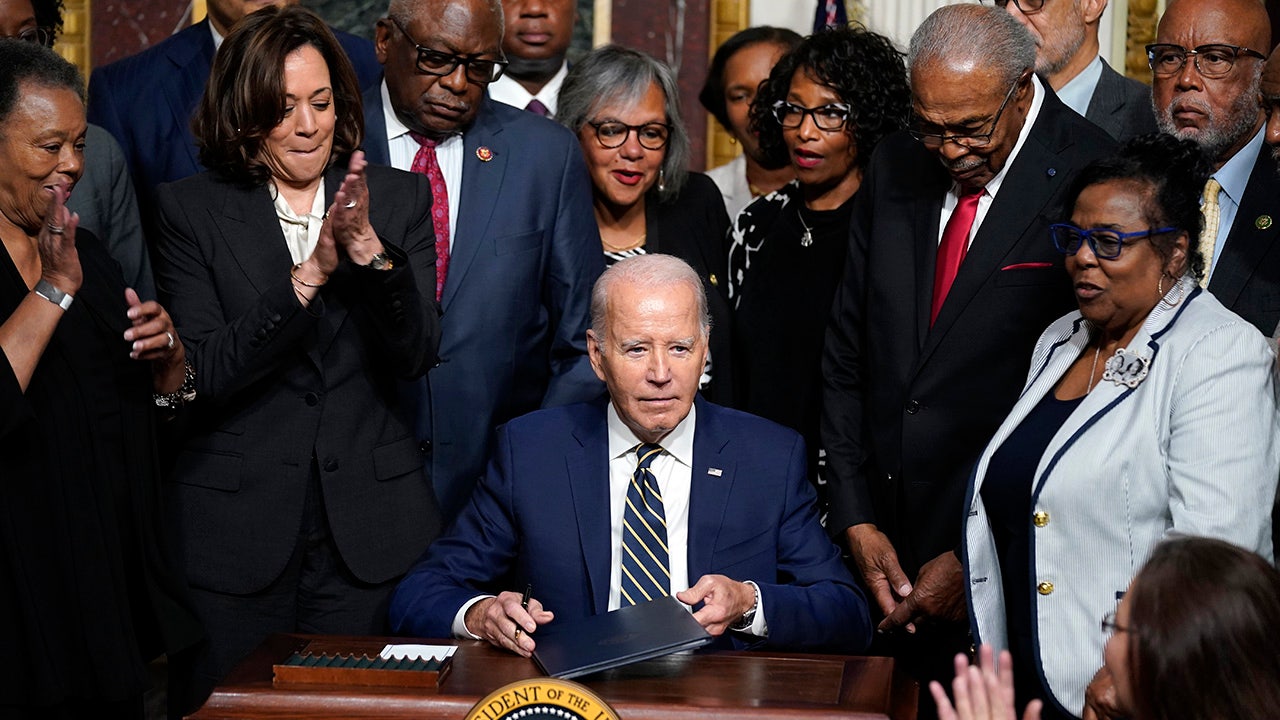 Biden signs Emmett Till's proclamation.