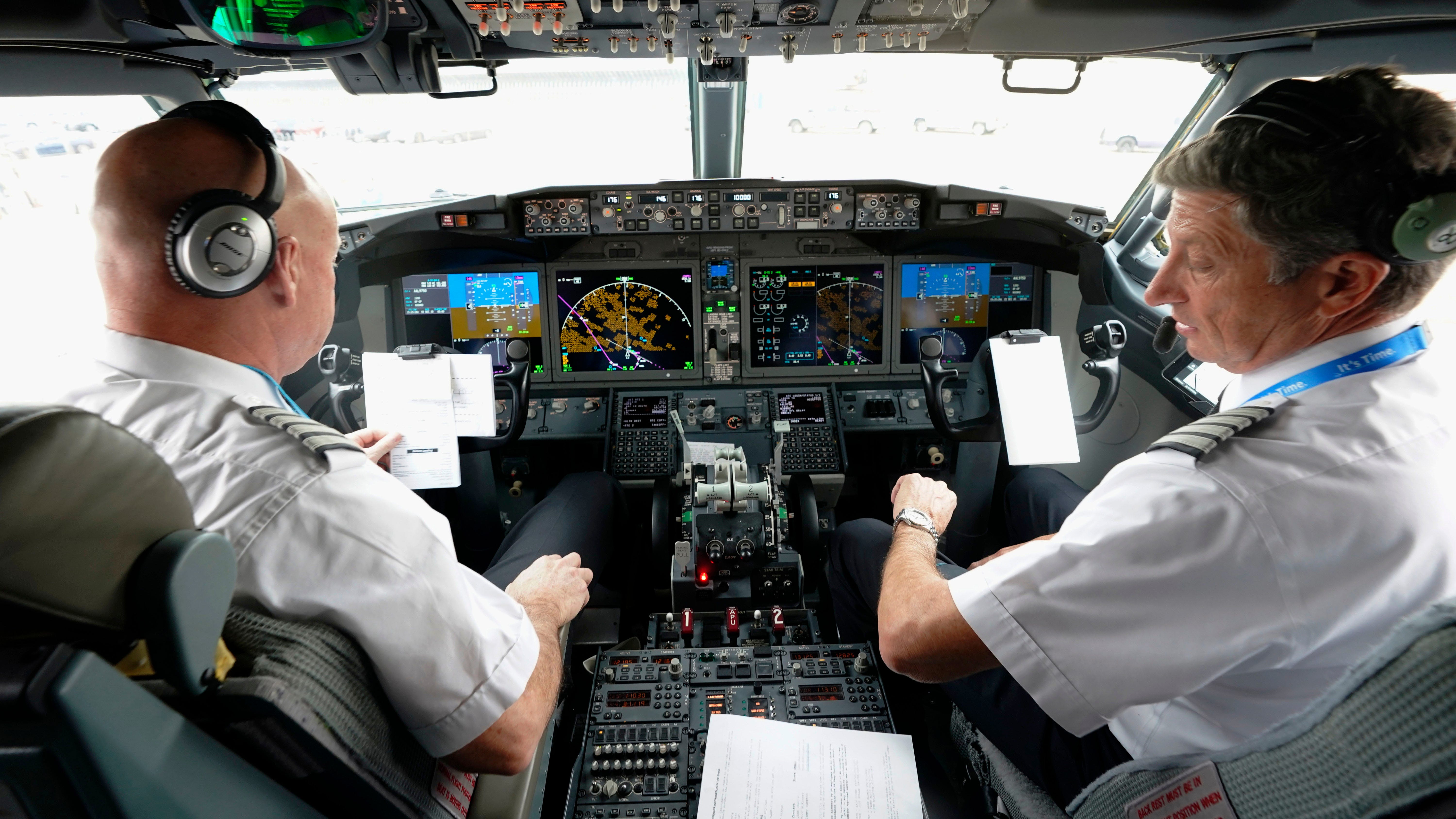 American Airlines pilots prepare for takeoff