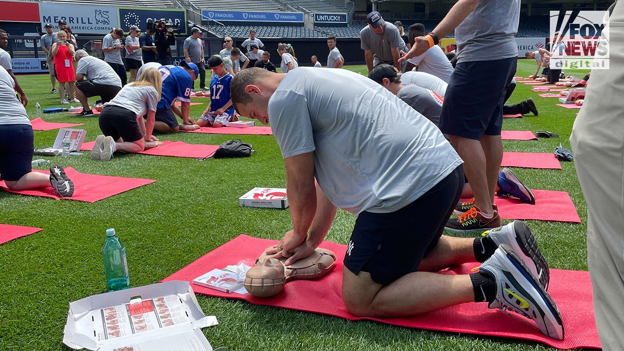 Anthony Rizzo practicing CPR