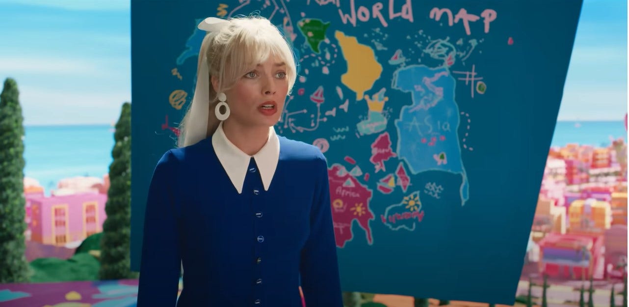 Margot Robbie in front of the cartoon map showing the nine dash line