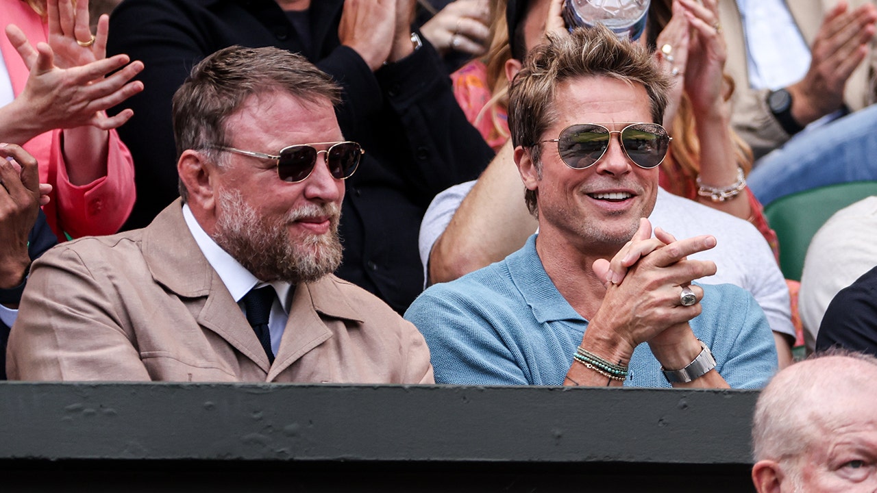 Brad Pitt watching Wimbledon from the stands