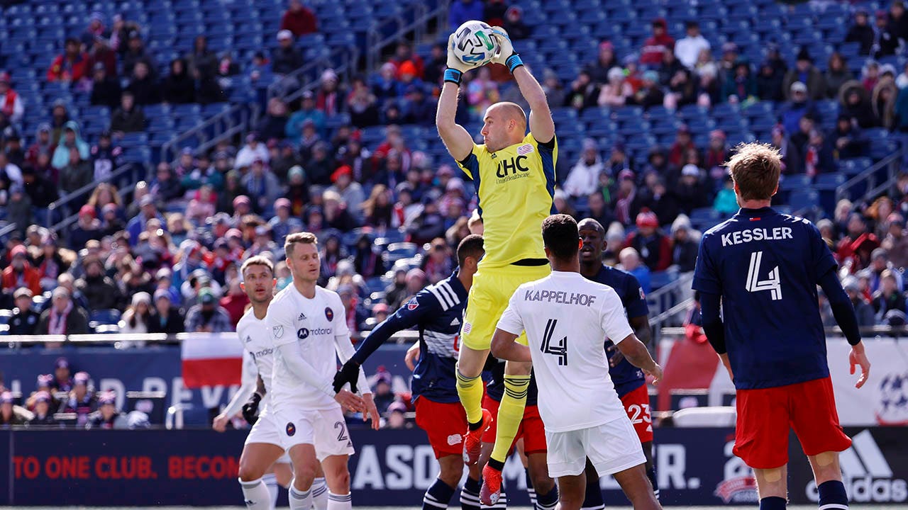 Brad Knighton makes a save during a cross kick