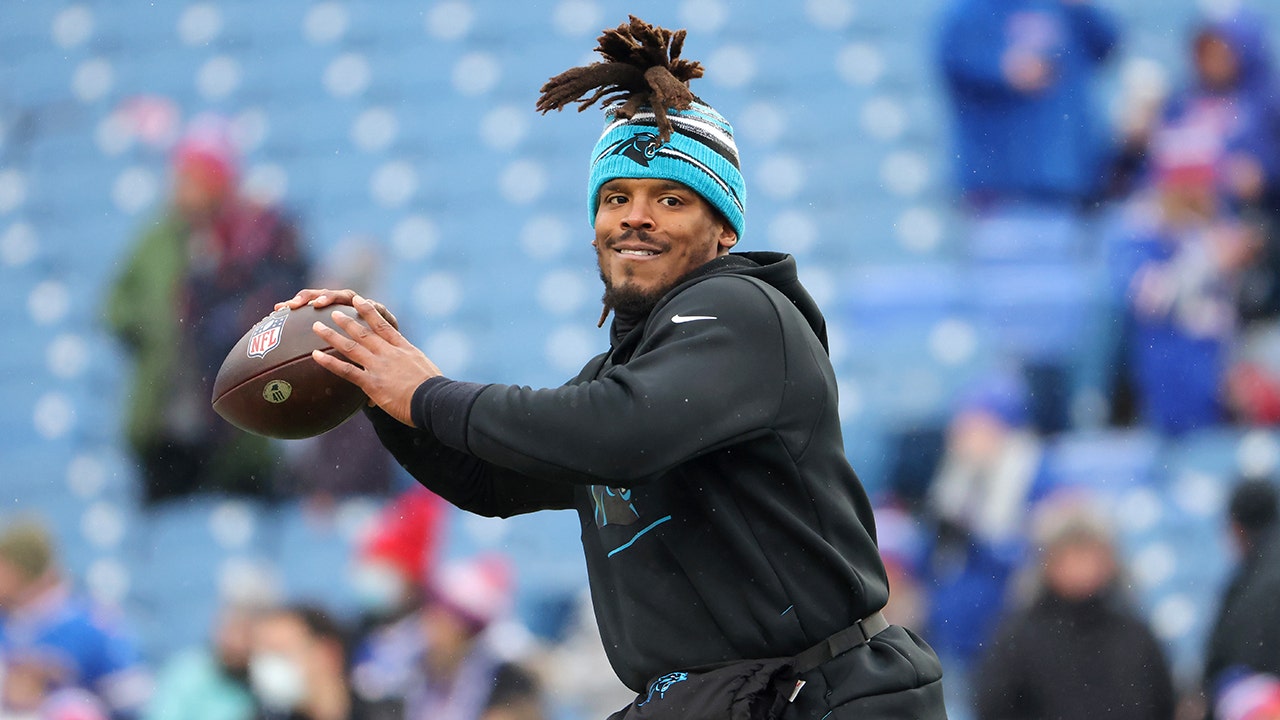 Cam Newton warms up vs Bills