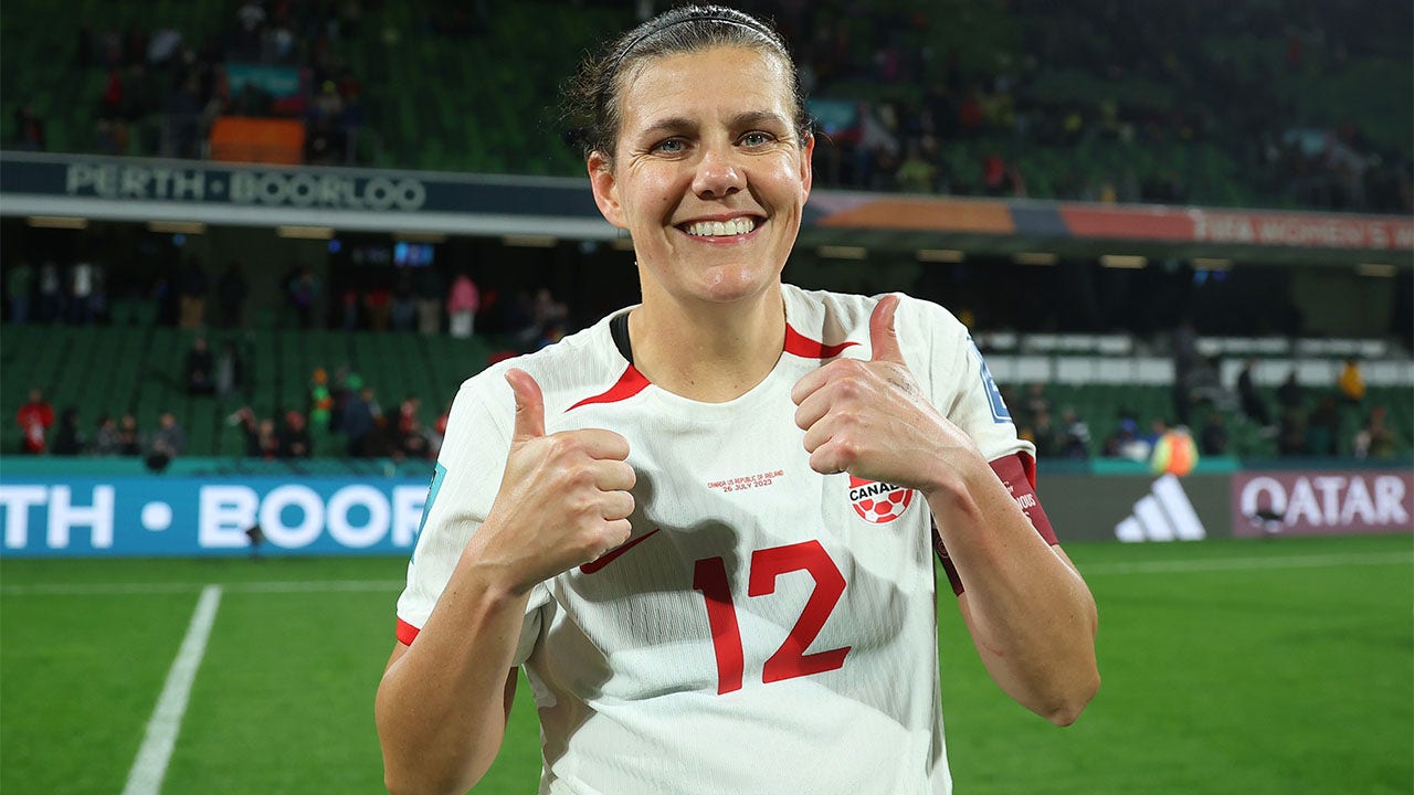 Christine Sinclair celebrates