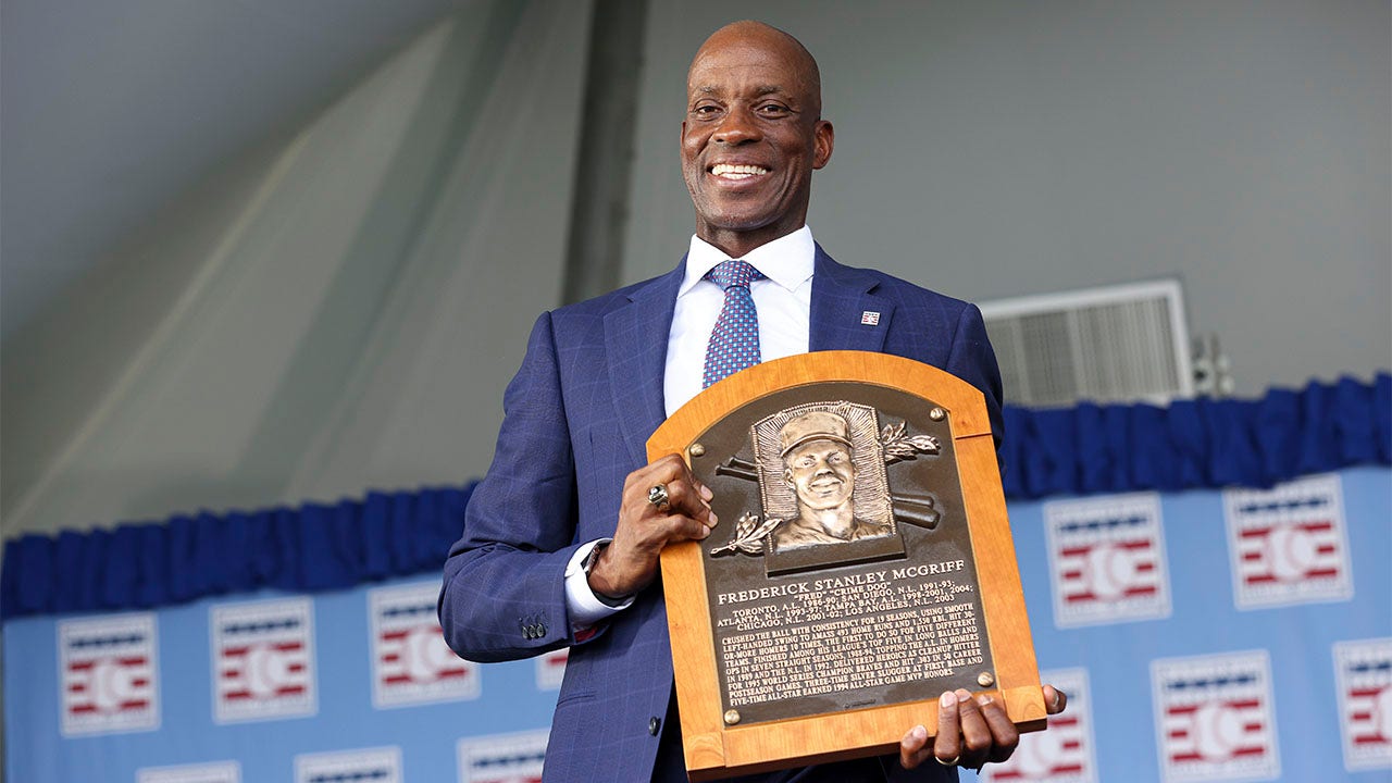 Fred McGriff poses with plaque