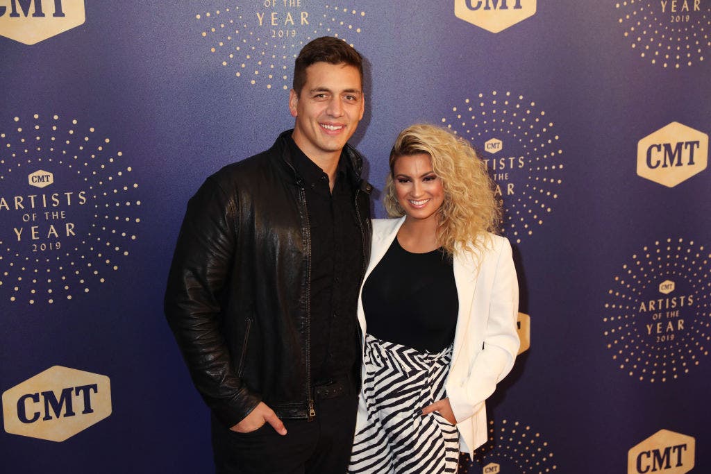Tori Kelly and her husband at the 2019 CMT Artists of the Year event