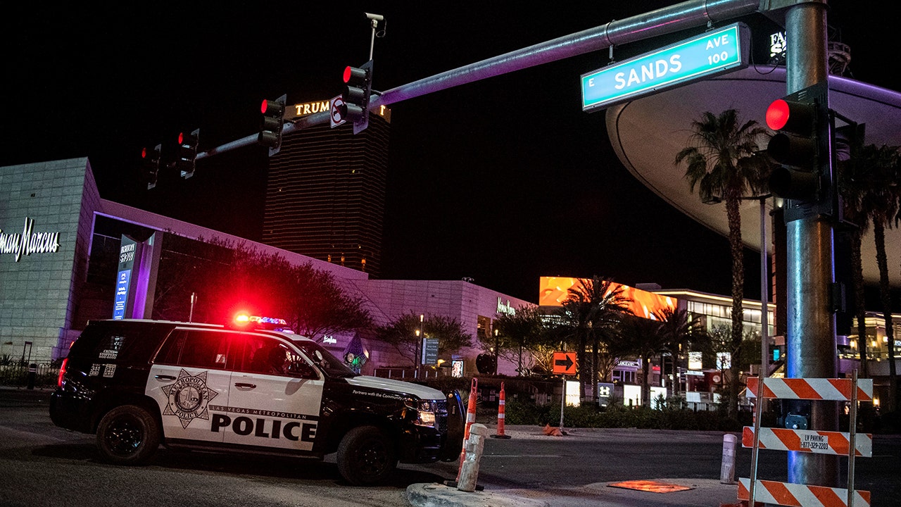 A police car blocks Las Vegas Boulevard