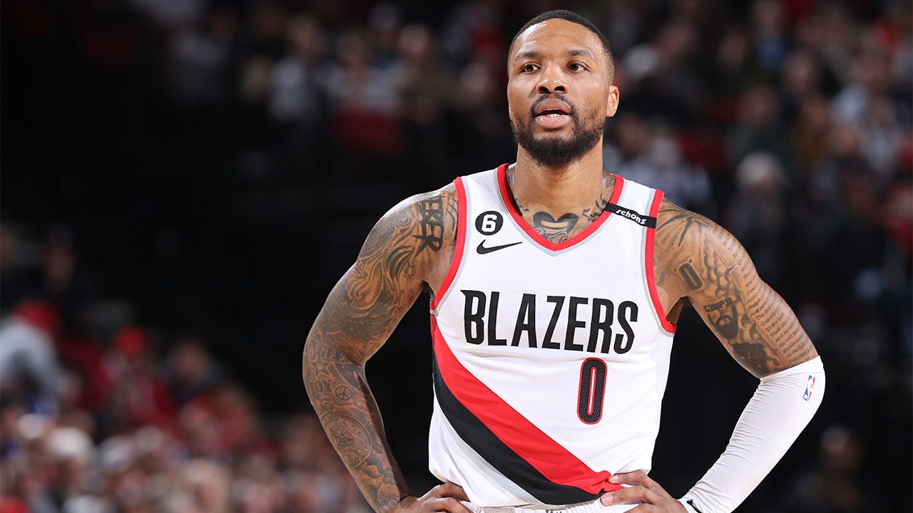 Damian Lillard looks on during a March game