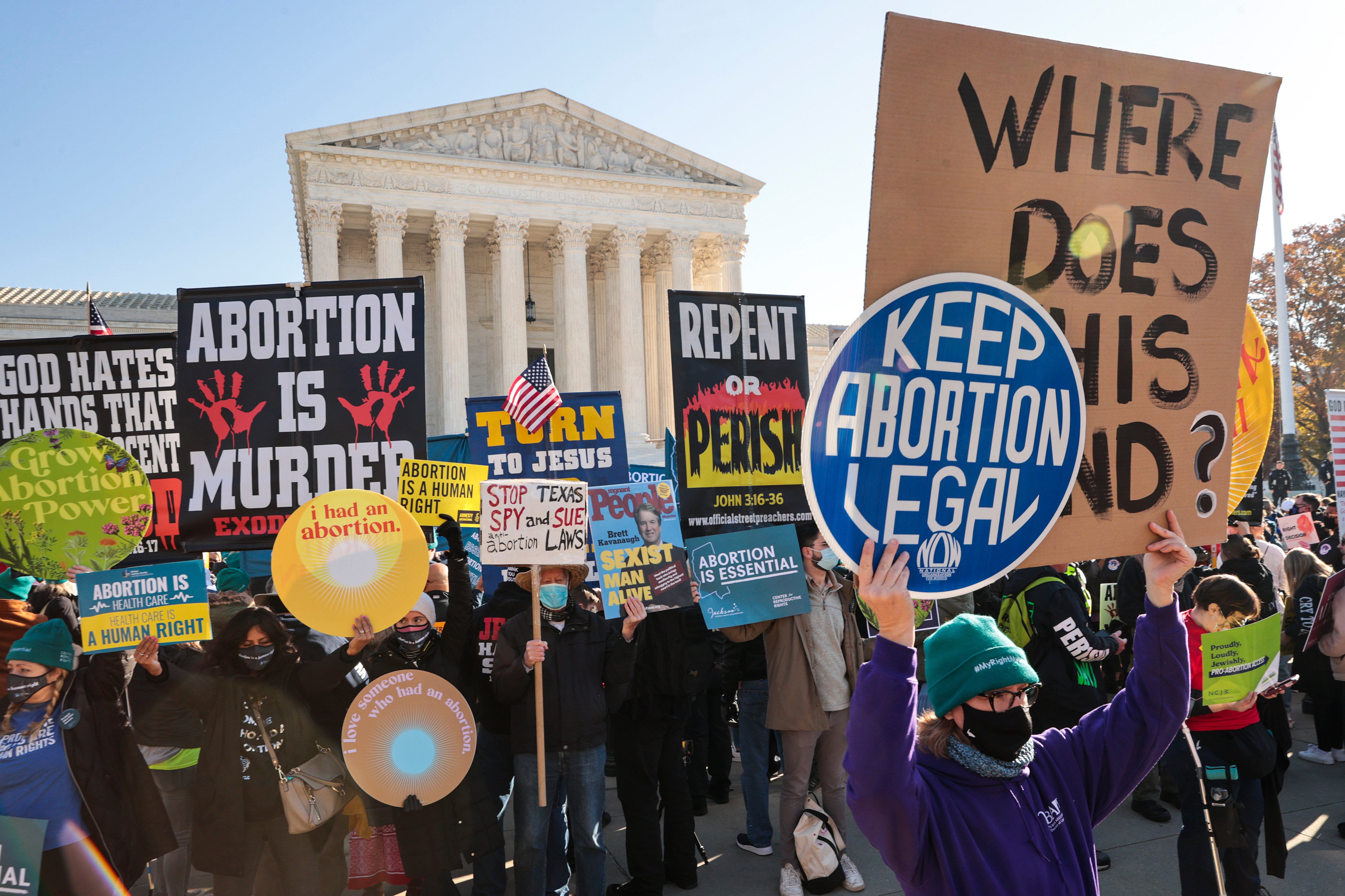 Demonstrators gather in front of the U.S. Supreme Court as the justices hear arguments in Dobbs v. Jackson Women's Health, a case about a Mississippi law that bans most abortions after 15 weeks, on December 1, 2021 in Washington, D.C.