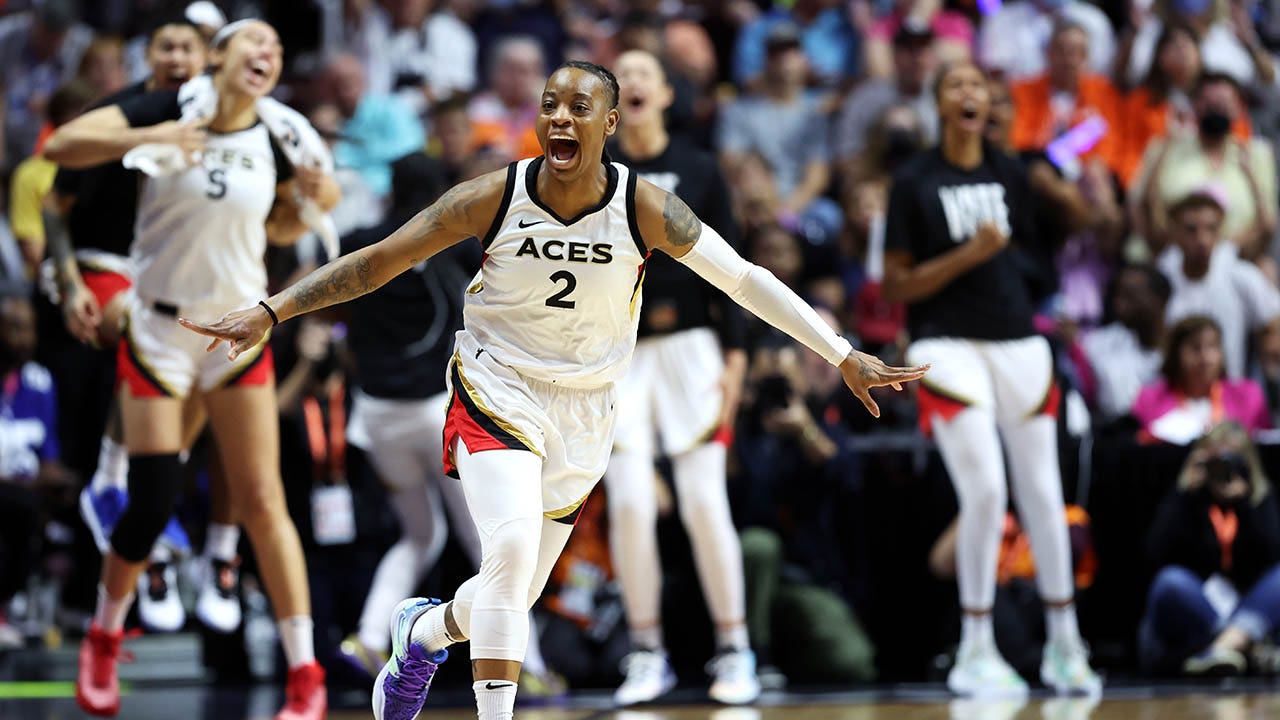 Riquna Williams celebrates during game four of the 2022 WNBA Finals