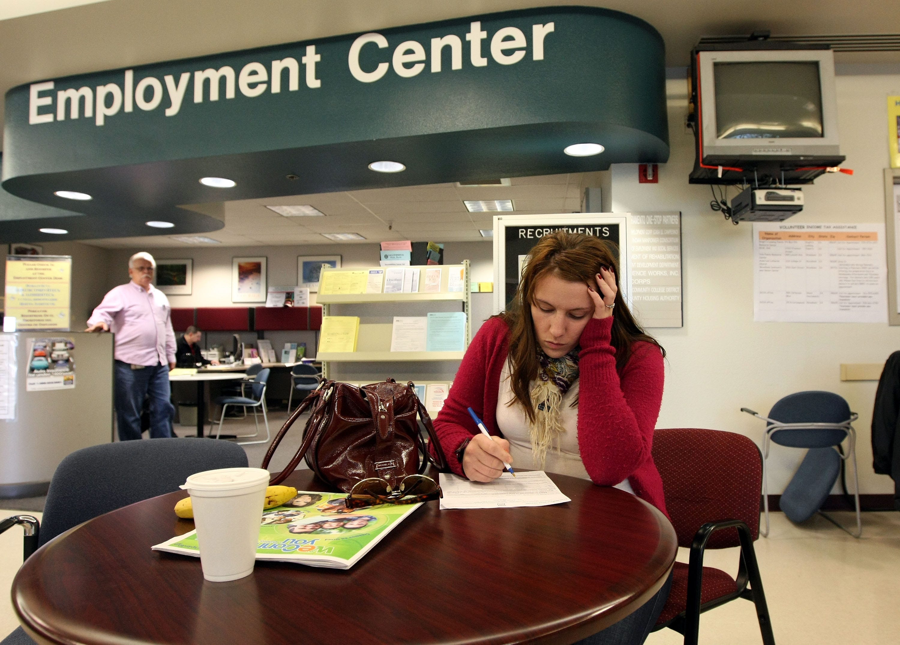 Brittney Nance fills out an application for food stamps at the Yolo County Department of Employment & Social Services, March 6, 2009 in West Sacramento, California.